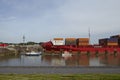 Brunsbuettel - Container vessel at lockage to the Kiel Canal Royalty Free Stock Photo