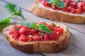 Bruschetta bread with chopped tomato and basil Royalty Free Stock Photo