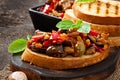 Bruschetta caponata with raisins and pine nuts Royalty Free Stock Photo