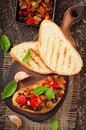 Bruschetta caponata with raisins and pine nuts Royalty Free Stock Photo