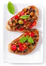 Bruschetta caponata with raisins and pine nuts Royalty Free Stock Photo