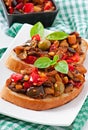 Bruschetta caponata with raisins and pine nuts Royalty Free Stock Photo