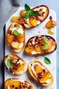Bruschetta with caramelized pears and cheese, delicious crostini for gourmet breakfast, brunch or lunch Royalty Free Stock Photo