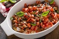 Bruschetta chicken in a casserole dish Royalty Free Stock Photo