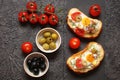 Bruschetta, crostini with cream cheese, with cherry tomatoes, he