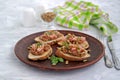 Bruschetta with duck confit pate, apple chutney and caramelized pumpkin seeds Royalty Free Stock Photo