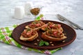 Bruschetta with duck confit pate, apple chutney and caramelized pumpkin seeds Royalty Free Stock Photo