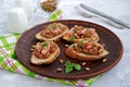 Bruschetta with duck confit pate, apple chutney and caramelized pumpkin seeds Royalty Free Stock Photo