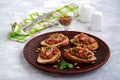 Bruschetta with duck confit pate, apple chutney and caramelized pumpkin seeds Royalty Free Stock Photo