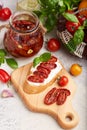 Bruschetta with goat cheese, sun dried tomatoes and basil leaf Royalty Free Stock Photo