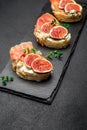 Bruschetta with ham, blue ceese and fresh figs Royalty Free Stock Photo