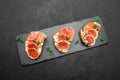 Bruschetta with ham, blue ceese and fresh figs Royalty Free Stock Photo