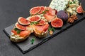 Bruschetta with ham, blue ceese and fresh figs Royalty Free Stock Photo