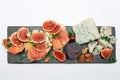 Bruschetta with ham, blue ceese and fresh figs Royalty Free Stock Photo