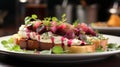Bruschetta with herring and beet in white plate on white table
