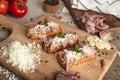 Bruschetta: homemade sheep`s cheese, bacon, sauerkraut, garlic, homemade bread, herbs and spices. Italian food Royalty Free Stock Photo