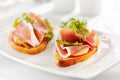 Bruschetta with Parma Ham and Parmesan Cheese. Royalty Free Stock Photo