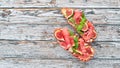 Bruschetta with prosciutto, fresh figs and cheese. On the old background. Healthy food. Free space for text. Royalty Free Stock Photo