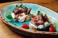 Bruschetta with roast beef. Royalty Free Stock Photo