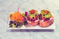 Bruschetta salmon with avocado, side of salad