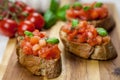 Bruschetta - sandwitch with tomatoes, basil and oliven oil Royalty Free Stock Photo