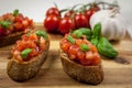 Bruschetta - sandwitch with tomatoes, basil and oliven oil Royalty Free Stock Photo