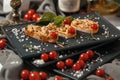 Bruschetta with smoked meat and cherry tomatoes Royalty Free Stock Photo