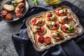 Bruschetta toast with mozzarella tomatoes olives