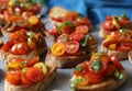 Bruschetta with tomatoes, basil and parsley,  an Italian delicious savory  appetizer. Royalty Free Stock Photo