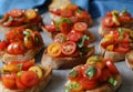 Bruschetta with tomatoes, basil and parsley,  an Italian delicious savory  appetizer. Royalty Free Stock Photo