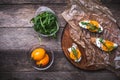 Bruschetta with tomatoes and rucola on board in rustic style Royalty Free Stock Photo