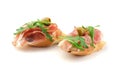 Bruschettas with jamon and arugula isolated