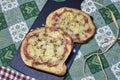 Bruschette con salame e formaggio. slices of bread with salami and cheese