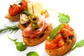 Bruschette with prosciutto and olive Royalty Free Stock Photo
