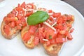 Bruschette with tomato, cheese and basil Royalty Free Stock Photo