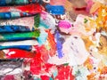 Brush and bright oil-paint palette for background Royalty Free Stock Photo