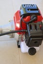 Brush cutter engine on the floor Royalty Free Stock Photo