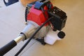 Brush cutter engine on the floor Royalty Free Stock Photo