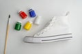 Brush, paint and blank sneaker Royalty Free Stock Photo