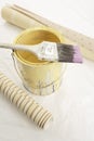 Brush paint can and two wall paper samples