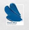 Brush and paint texture on paper classic blue. Color of the year 2020