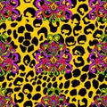 Brush painted tiger seamless pattern. Yellow leopard spots and doodle ribbon background.