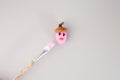 brush painting little acorn, top view, grey background, step in creative process, activity for kids, Royalty Free Stock Photo