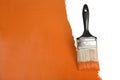 Brush Painting Wall With Orange Paint Royalty Free Stock Photo