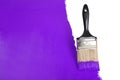 Brush Painting Wall With Purple Paint