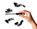 Brush stroke of black shade of mascara on white Royalty Free Stock Photo