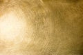 Brushed brass plate with multiple scratches and light reflection Royalty Free Stock Photo