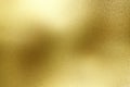 Brushed gold hard metal wall with scratched surface, abstract texture background Royalty Free Stock Photo