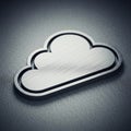 Brushed metal cloud icon on textured, dark surface. The cloud shape is sleek with Royalty Free Stock Photo