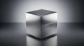 Brushed Metal Cube on Reflective Surface Royalty Free Stock Photo
